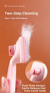 Pet grooming brush detail showing the one-button hair release mechanism for easy cleaning