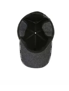 Detail of winter baseball cap interior showing ear flaps and brand text on brim