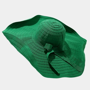 Green wide-brim sun hat with stripe stitching and a stylish decorative bow for beach