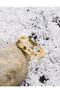 Detailed close-up of S925 sterling silver ring with wrinkled texture and colorful stones