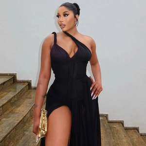Detail of elegant black slim-fit evening dress with one-shoulder cutout and side slit