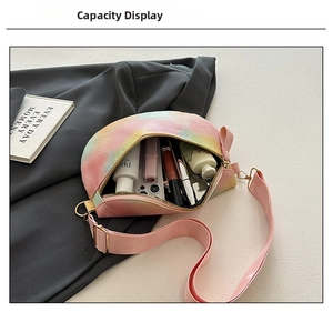 Macro shot of colorful gradient crossbody bag capacity showing lipstick and cosmetics