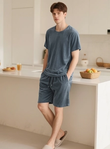 Detail of men's blue grey loungewear set featuring soft velvet texture and drawstring shorts