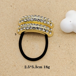 Elegant gold metal starfish hair tie with sparkling rhinestones for ponytail styling