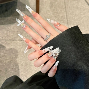 Handmade gradient butterfly press-on nails with bow and diamond accents in coffin shape