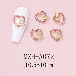 Pink heart nail charm with golden bow detail and 10.5x10mm size dimensions shown