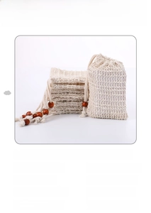 Detail of 9x14cm cotton linen soap bag with wooden bead drawstring and woven texture