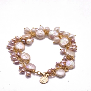 Baroque pearl bracelet with multi-layer gold chain and religious coin pendant