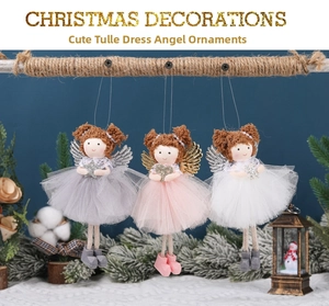 Detailed view of Christmas angel plush dolls with mesh skirts and wings on a wooden branch