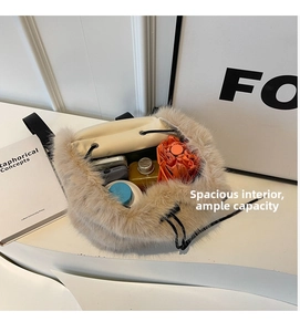 Internal view of fluffy beige faux fur backpack showing large storage for daily items