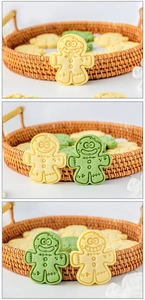 Detail showing zombie gingerbread cookies with intricate textures on a wicker tray