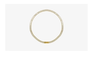 Detail view of gold tennis necklace with rectangular zircons and a fold-over clasp