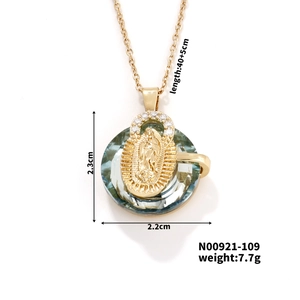 Detail view of Virgin Mary pendant with light blue stone and 45cm chain dimensions