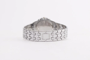 Detail view of the silver steel watch band featuring a secure folding clasp and link chain