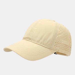 Detail of breathable laser-cut vent holes on quick-dry khaki baseball cap fabric