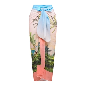 Detail view of the tropical palm tree print and blue tie-waist on this summer sarong