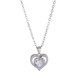 Silver heart pendant necklace with nested heart design and cubic zirconia stones