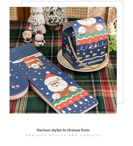 Detail showing flat-packed and assembled Santa Christmas gift boxes with gold ropes