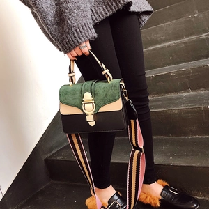 Fashionable tricolor patchwork crossbody bag with striped strap and gold ring lock
