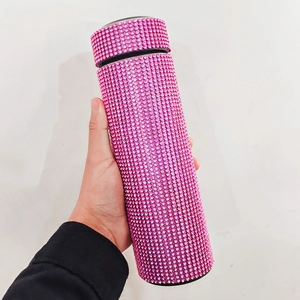 Close-up of rose pink rhinestone studded thermos with LED smart temperature display