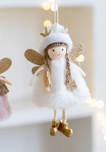Detail of white plush Christmas angel doll with golden antlers and sequined wings