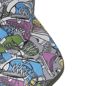 Close-up of graffiti sneaker print on thick canvas baseball cap with white stitching