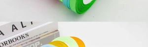 Detail showing various colors of 1cm satin ribbons for gift wrapping and DIY crafts