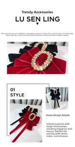 Detailed view of luxury velvet bow brooch with oversized oval rhinestone and tassels