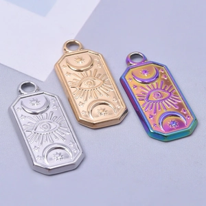 Minimalist stainless steel evil eye pendants in gold, silver, and rainbow finishes
