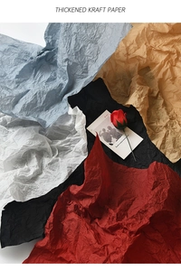Close-up of thickened wrinkled kraft paper in multiple colors with textured fiber details