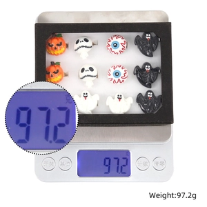 Adjustable Halloween ring set weight display featuring pumpkin and ghost designs