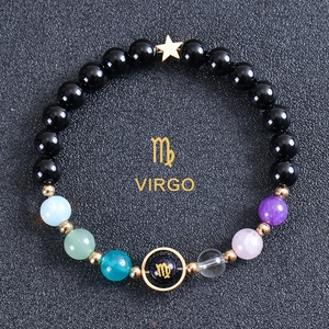 Detailed view of Virgo zodiac beaded bracelet with black onyx and colorful gemstones