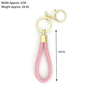 Pink braided leather keychain with golden lobster clasp for car keys and bags