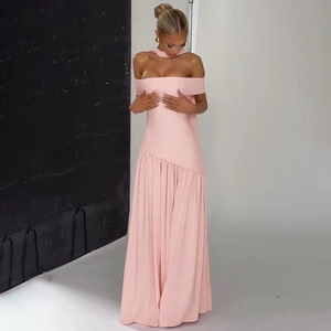 Detail view of the pink off-shoulder long dress with a neck scarf and elegant draped hem