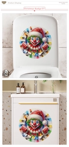 Detail of Santa and clown Christmas toilet lid decals applied in a bathroom setting