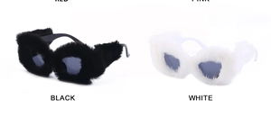 Detail showing black and white plush cat eye sunglasses with faux fur texture