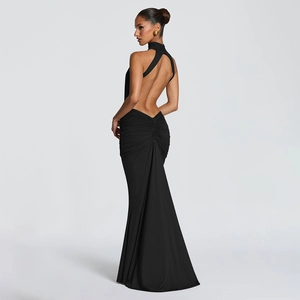 Detailed back view of a black halter neck evening gown with elegant ruching and fishtail hem