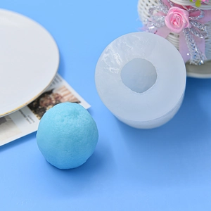 3D silicone mold for lemon shaped candles with realistic fruit texture on blue background