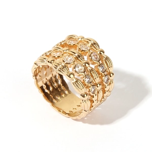 Elegant gold-plated wide band ring with multi-row sparkling zircon crystals on white background