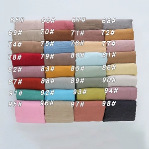 Detailed color chart showcasing 32 shades of pleated cotton linen scarves with SKU numbers