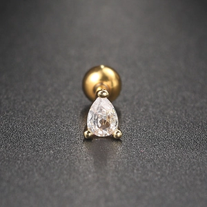 Detailed macro view of pear-cut cubic zirconia screw-back stud earring in gold finish