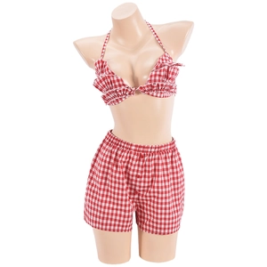 Detail of red and white plaid two-piece set with halter ruffled bra and matching shorts