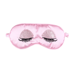 Pink silk sleep mask with sequin eyelash embroidery for blackout comfort and style