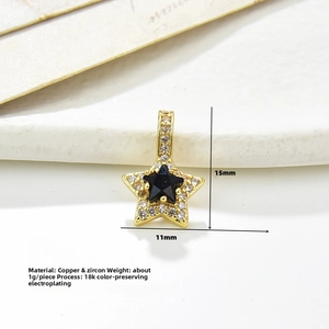 Detailed macro view of a 18k gold-plated star pendant with micro-pave zircons