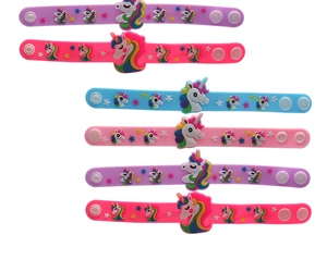 Detailed view of colorful unicorn silicone snap bracelets with embossed cartoon patterns