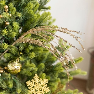 Golden sequin glitter willow spray for Christmas tree decoration and festive DIY crafts