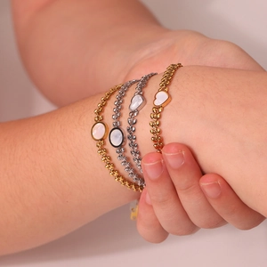 Bracciali in acciaio inossidabile placcato oro 18k con cuore e madreperla bianca