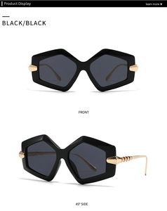 Detail view showing front and 45-degree angle of black hexagon frames with gold metal temples