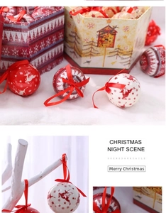 Detailed view of red and white Christmas ornaments with reindeer and snowflake patterns