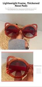 Detail of red glitter cat-ear frame kids sunglasses with thick nose pads for comfort